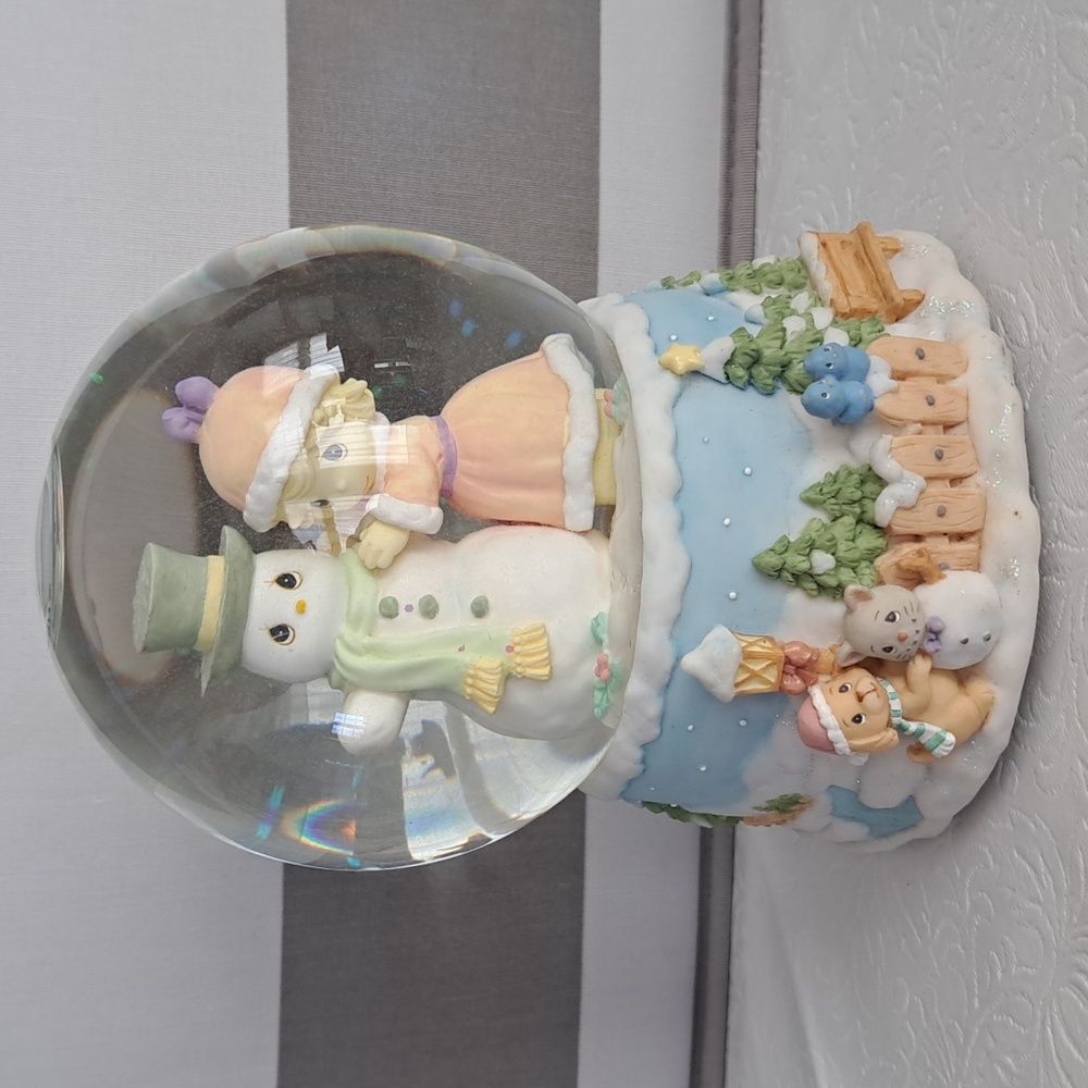 precious moments snow globe          we wish you a merry christmas
